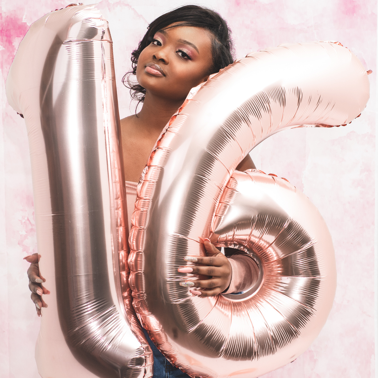 Photography of Girl Holding Inflatable Number 16 Decor