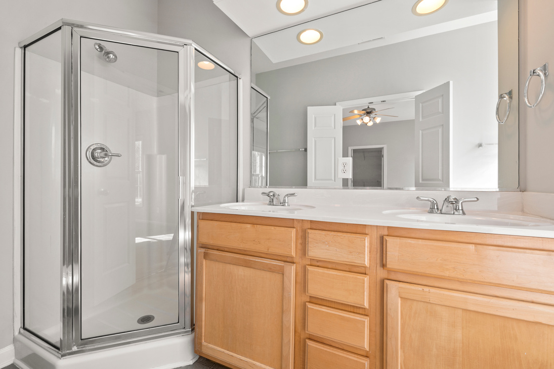 Bathroom with Glass Wall Shower Area and Mirror