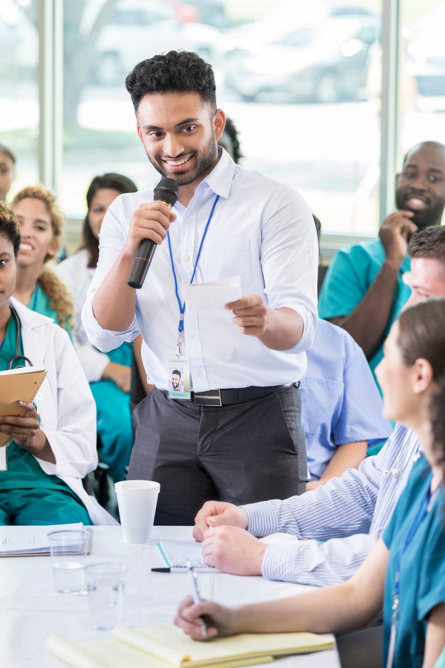 Hospital administrator facilitates healthcare seminar